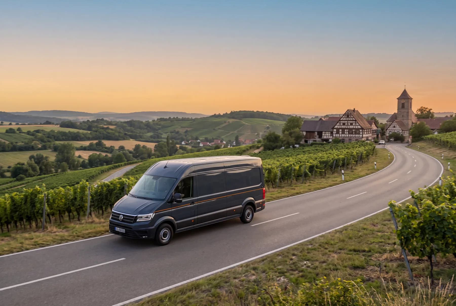 Delivery van on a country road between Franconian vineyards